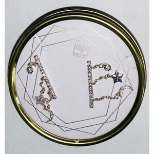 B.B. Lila Star and Moon Ear Climbers